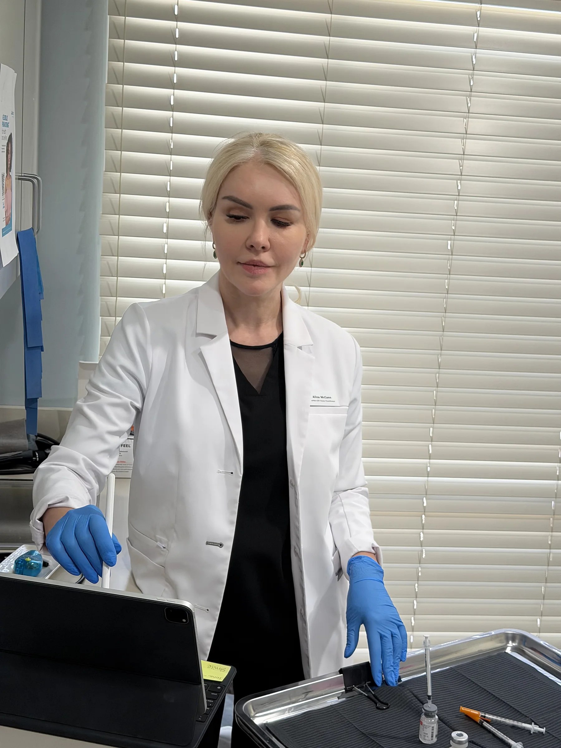 Alina McCann reviewing results at the counter