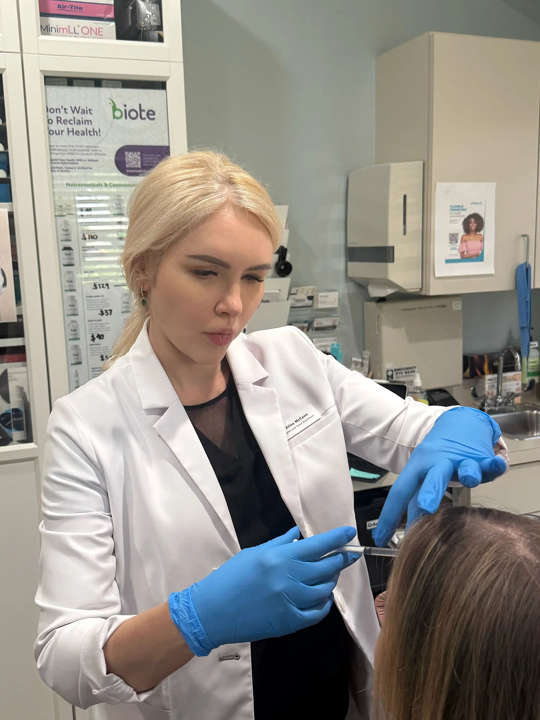 Alina McCann drawing up an infusion