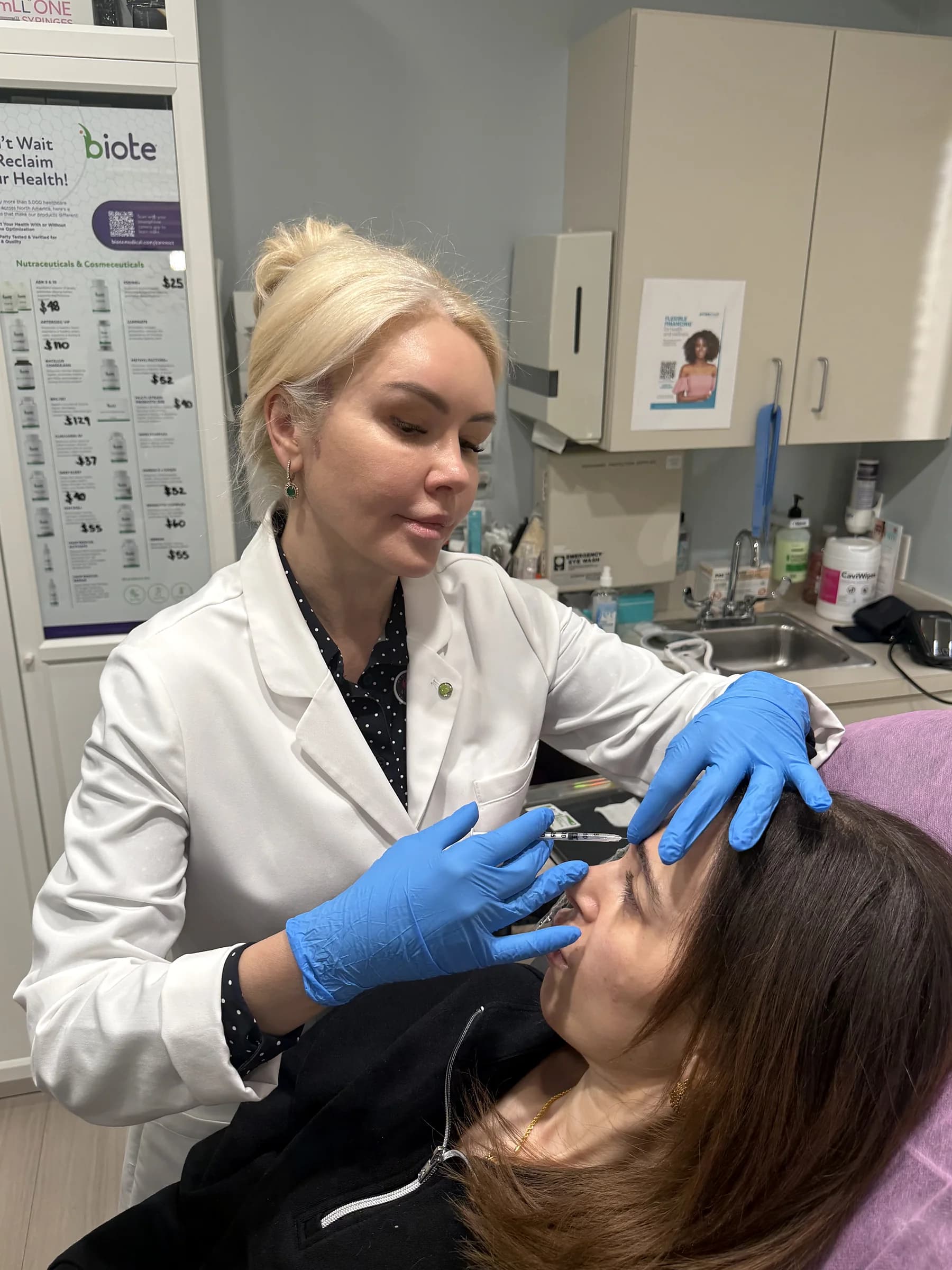 Alina McCann assessing the bridge and tip of the nose