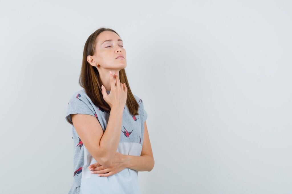 Female contemplating hormone replacement therapy post-pellet thyroid treatment, emphasizing wellness and health assessments.